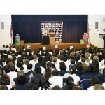 Random image: Collinswood Language Academy students gathered for a surprise visit from Jimmie (Charlotte, NC - December 16, 2010).